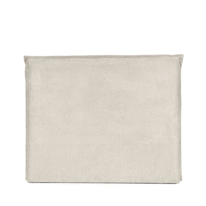Cabecero moderno en madera tapizada en suave tejido beige.