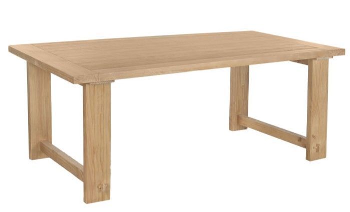 Mesa de comedor vintage en madera de pino natural.