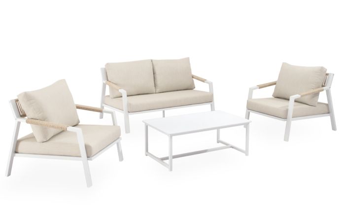 Conjunto de jardín étnico un sofá, sillones y una mesa de centro en mimbre, aluminio y porcelana en tono blanco y gris claro.