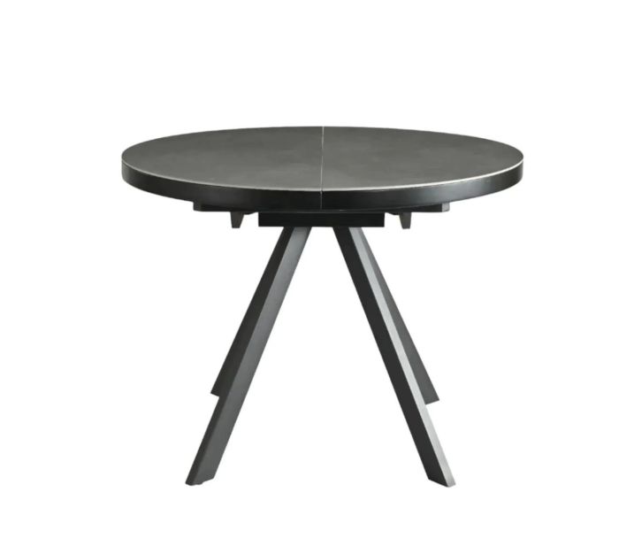 Mesa de comedor extensible en cerámica y metal gris.