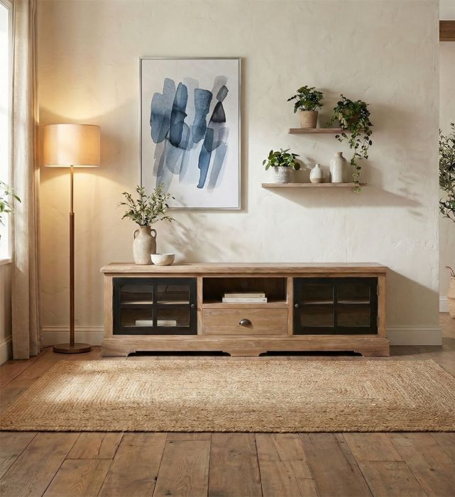 Mueble de TV en madera de mindi natural y negro con hierro bronce.