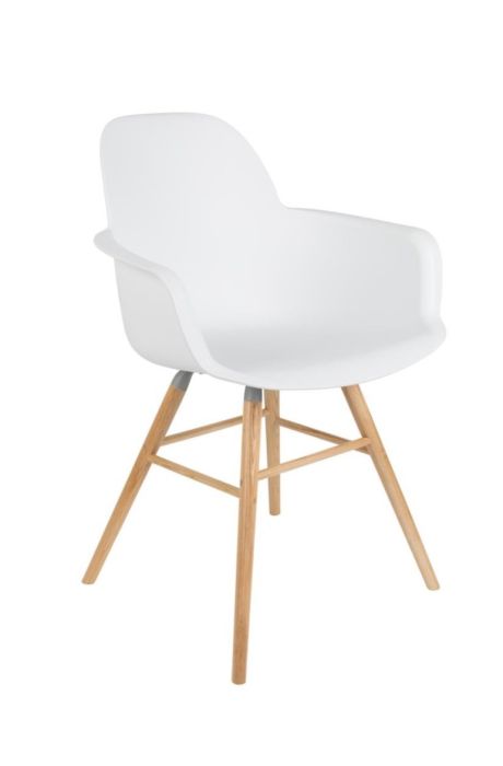Silla nórdica en polipropileno blanco con patas de madera de fresno natural.