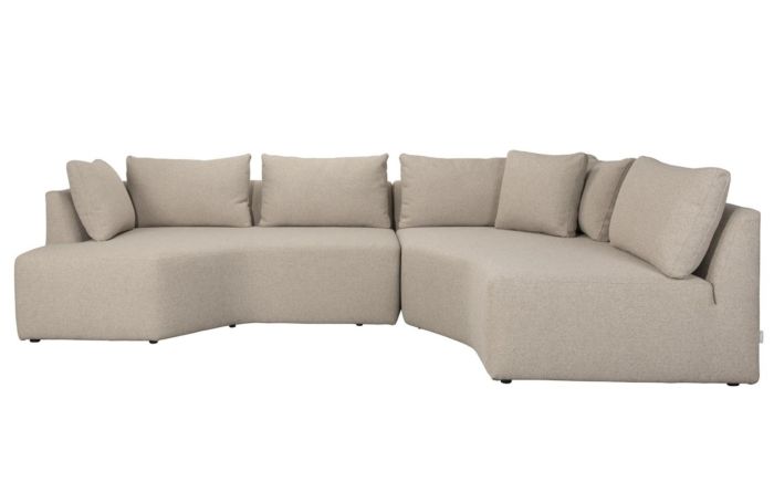 Sofá modular en madera de pino tapizado en tejido capuchino.