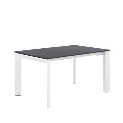 Mesa de comedor extensible diseño moderno en porcelánico negro, cristal templado y acero blanco.