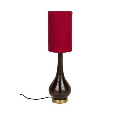 Lámpara de mesa moderna en hierro y vidrio negro con base de latón dorado y pantalla de algodón roja.