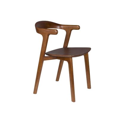 Silla nórdica en madera de caucho y contrachapada marrón.