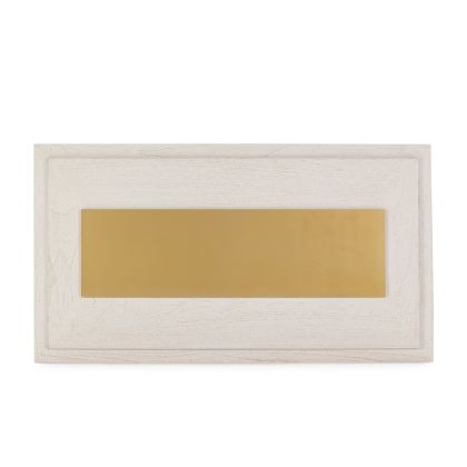Cabecero art decó en madera blanca con panel central de metal dorado.