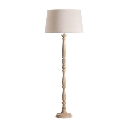 Lámpara de pie en madera de mango marrón claro y pantalla de algodón beige.