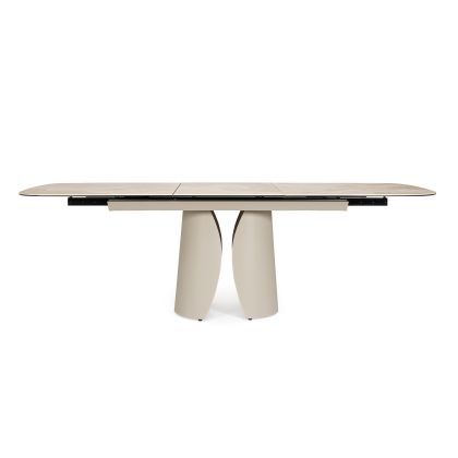 Mesa de comedor extensible diseño moderno tablero de cerámica efecto ónice con capa inferior de vidrio y acero beige.