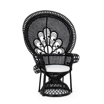Sillón étnico ratán y médula de junco negro en forma de abanico.