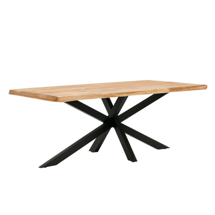 Industrial dining table in natural acacia wood with black metal legs.
