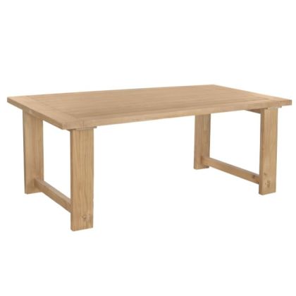Mesa de comedor vintage en madera de pino natural.