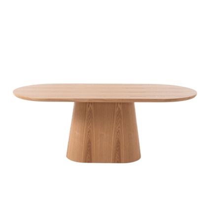 Mesa de comedor ovalada en roble natural.