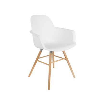 Silla nórdica en polipropileno blanco con patas de madera de fresno natural.
